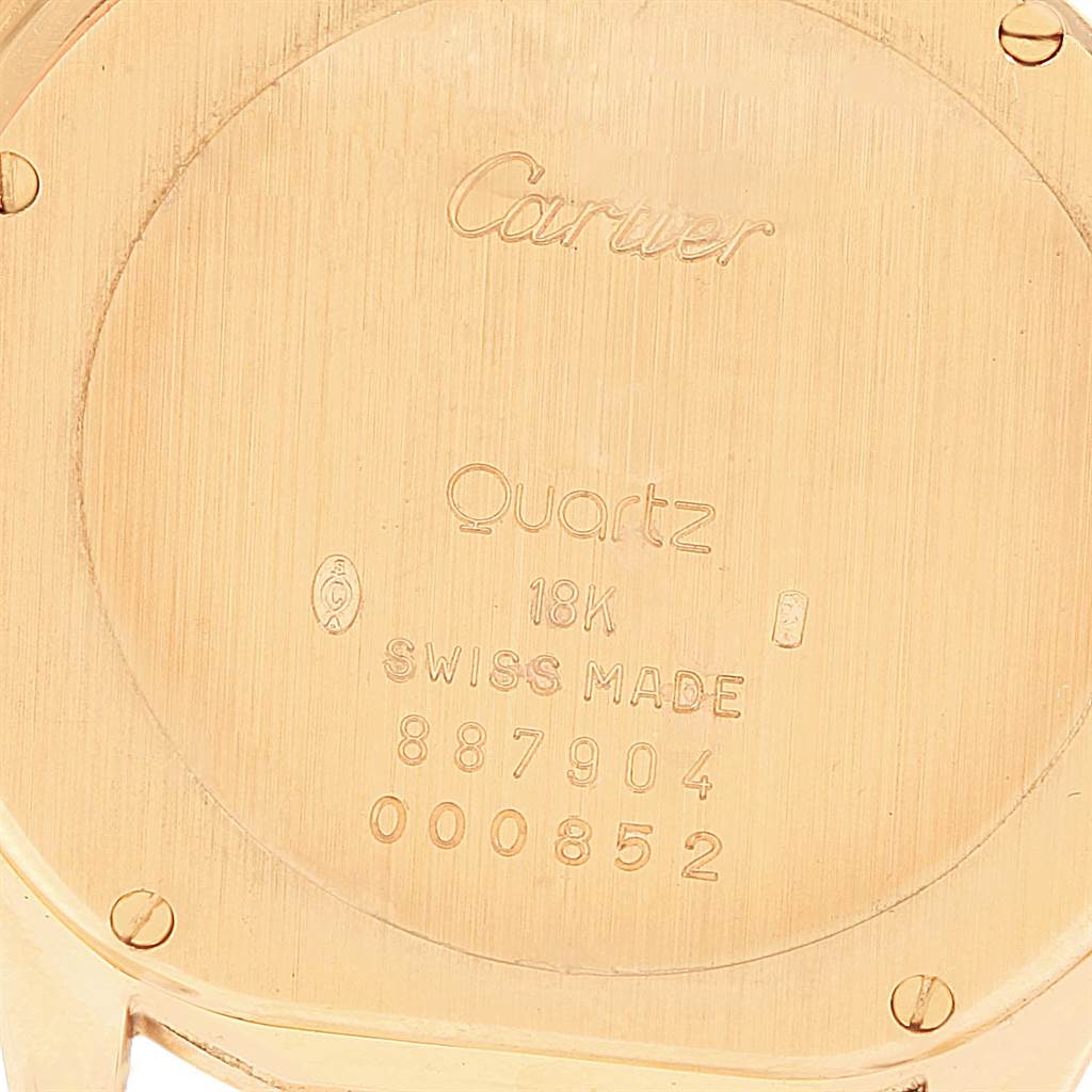 This image shows the back case of a Cartier Panthere 887904 Men
s Yellow Gold Silver Dial 887904 Men
s Yellow Gold Silver Dial model watch, displaying various inscriptions and markings.