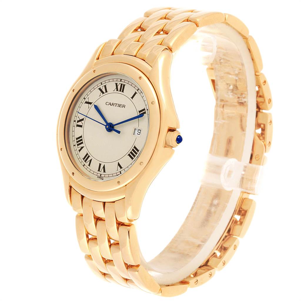 The Cartier Panthere 887904 Men
s Yellow Gold Silver Dial 887904 Men
s Yellow Gold Silver Dial model watch is shown at a slight angle, displaying its gold case, bracelet, dial, and blue hands.