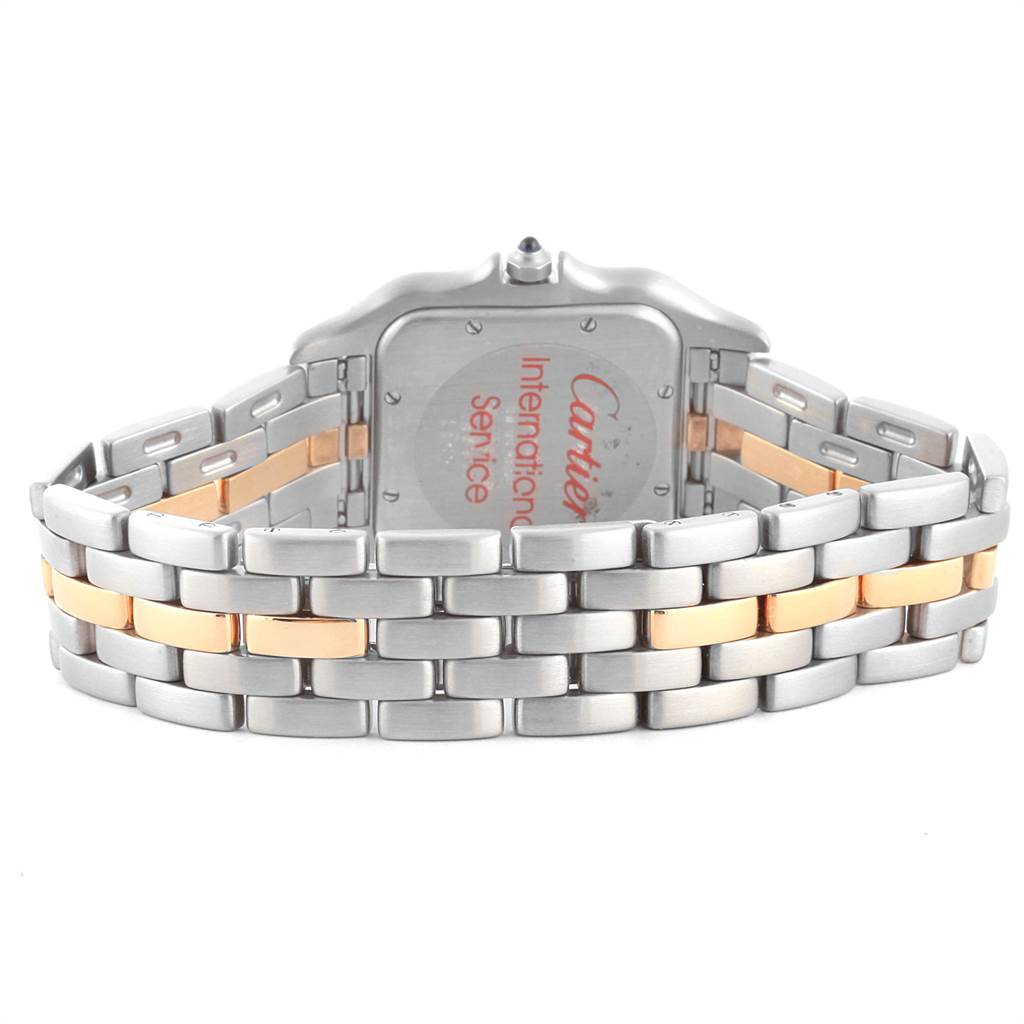 The image shows the back view of the Cartier Panthère watch, highlighting its two-tone metal bracelet and case back.