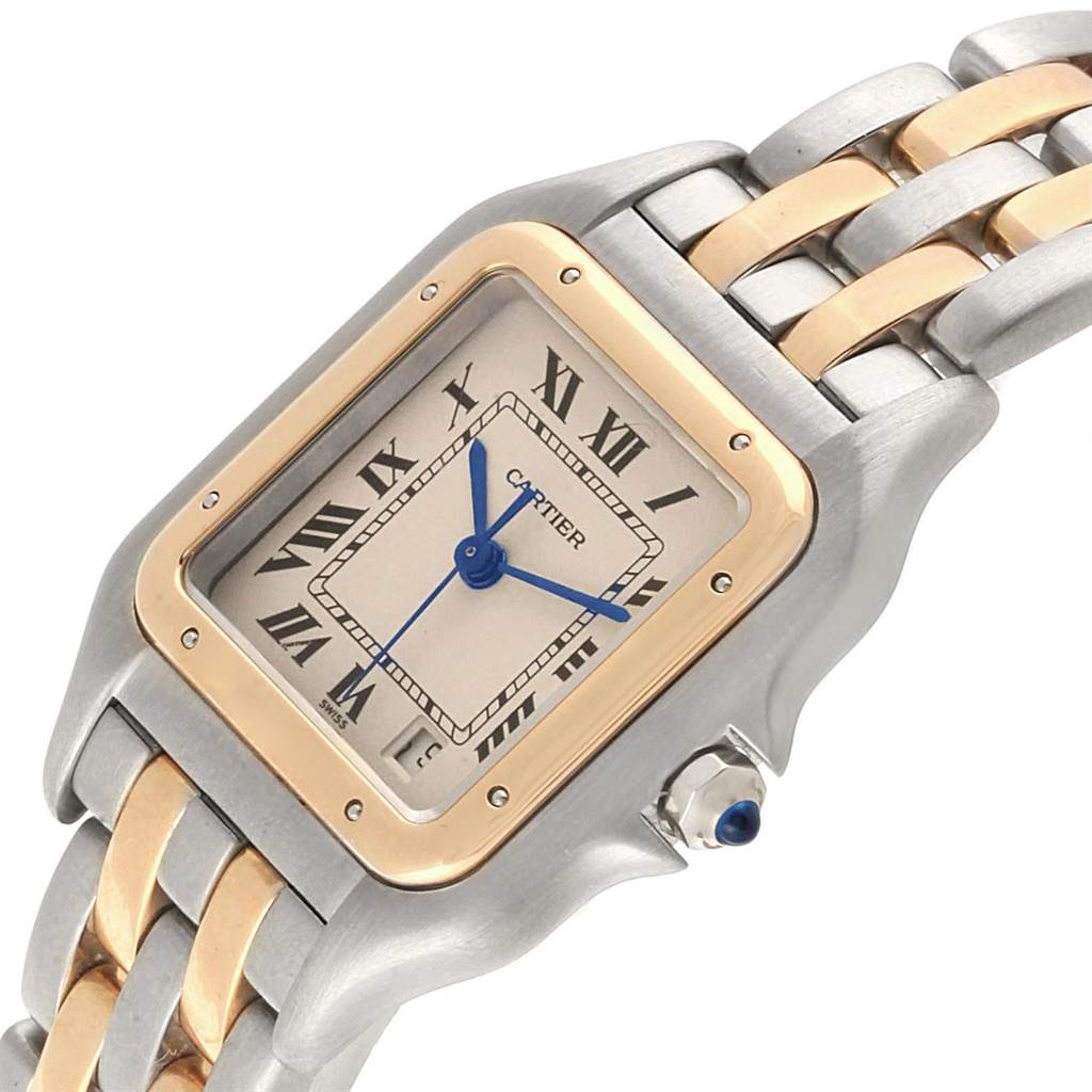 The image shows a close-up angled view of the Cartier Panthère watch, highlighting its face, bezel, and part of its metal strap.