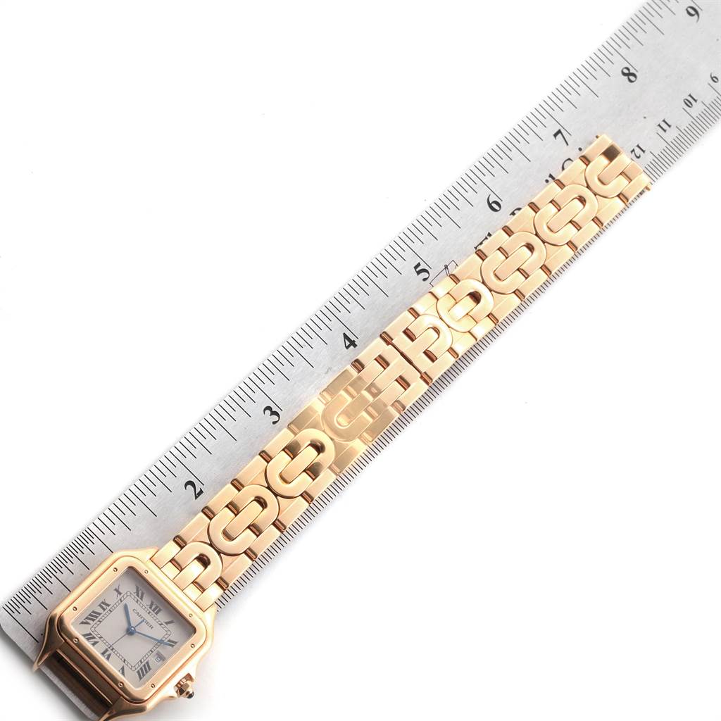 The Cartier Panthere W25014B9 Men's Yellow Gold Silver Dial W25014B9 Men's Yellow Gold Silver Dial watch is shown at a top-down angle with part of the band and the watch face visible.