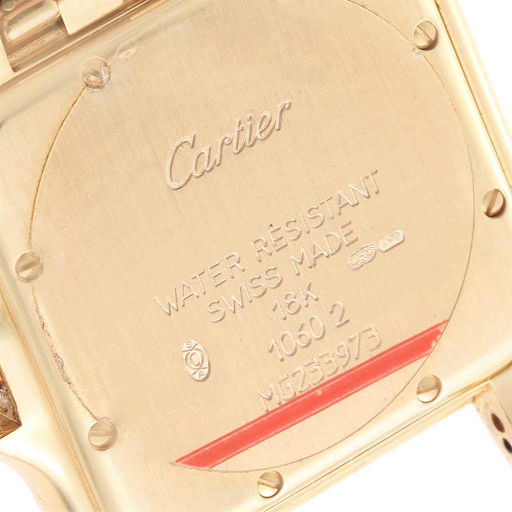This is a close-up view of the case back of a Cartier Panthere W25014B9 Men's Yellow Gold Silver Dial W25014B9 Men's Yellow Gold Silver Dial watch, showing various engravings and markings.