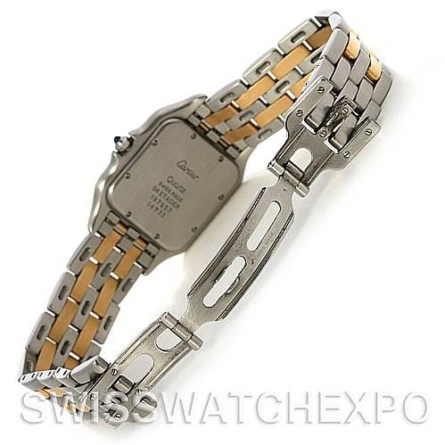 This image shows the back and clasp of a Cartier Panthère watch, highlighting the two-tone metal bracelet and the engraved case back.