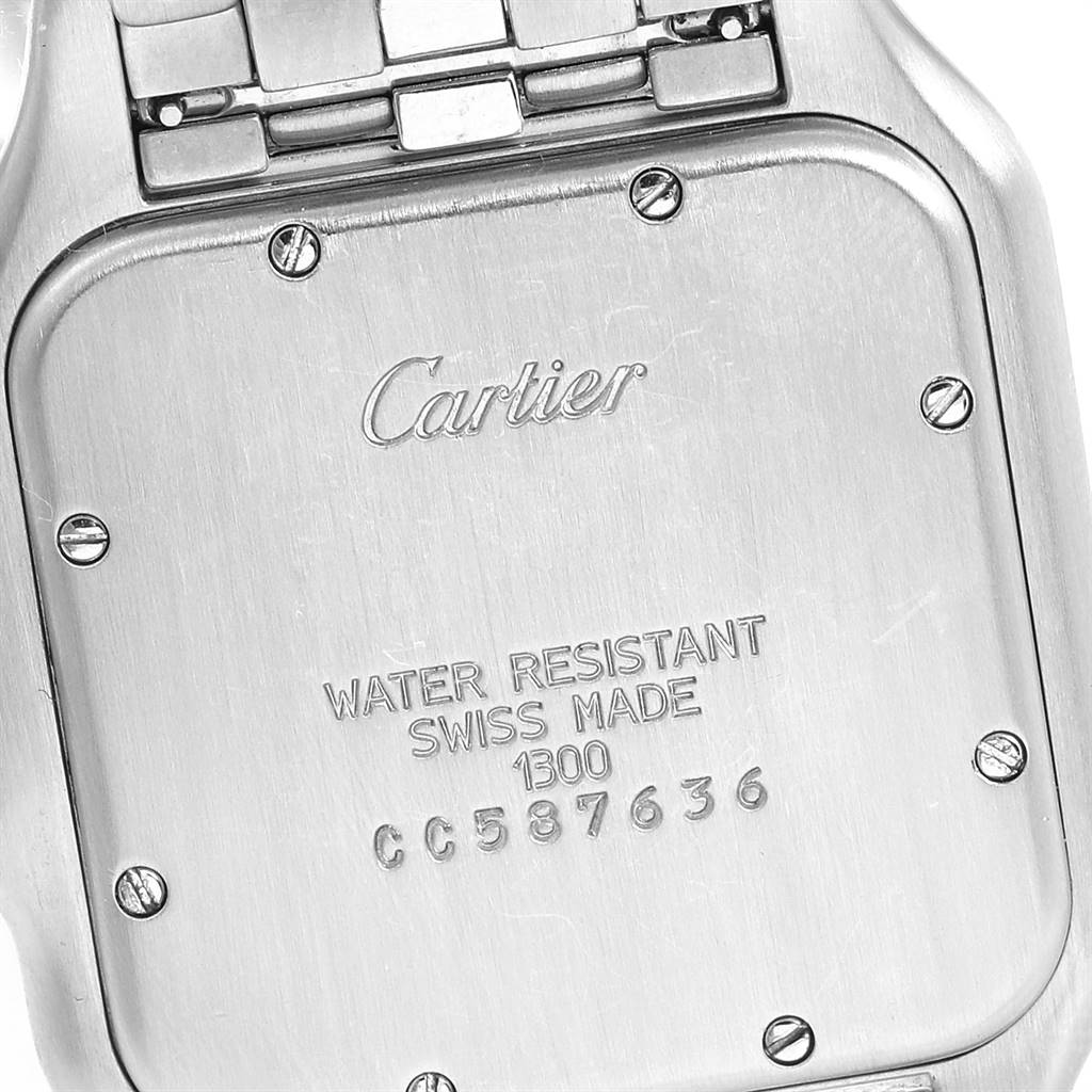 This image shows the back case of a Panthere model watch by Cartier, including the bracelet attachment and engraved details.
