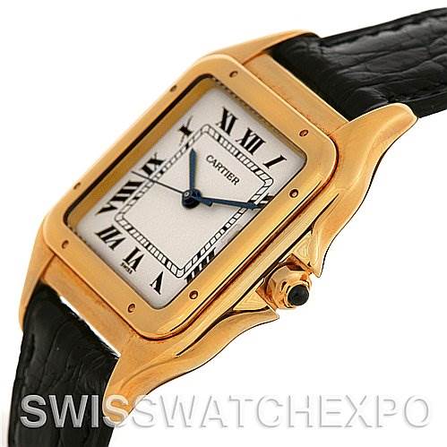 The image shows a side angle of the Panthere model by Cartier, highlighting the gold case, black strap, and crown.