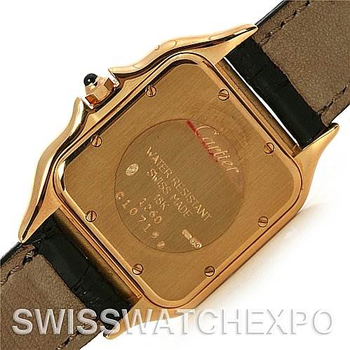 This image shows the back case and strap of a Cartier Panthère watch at an angled view, highlighting the case back engravings.