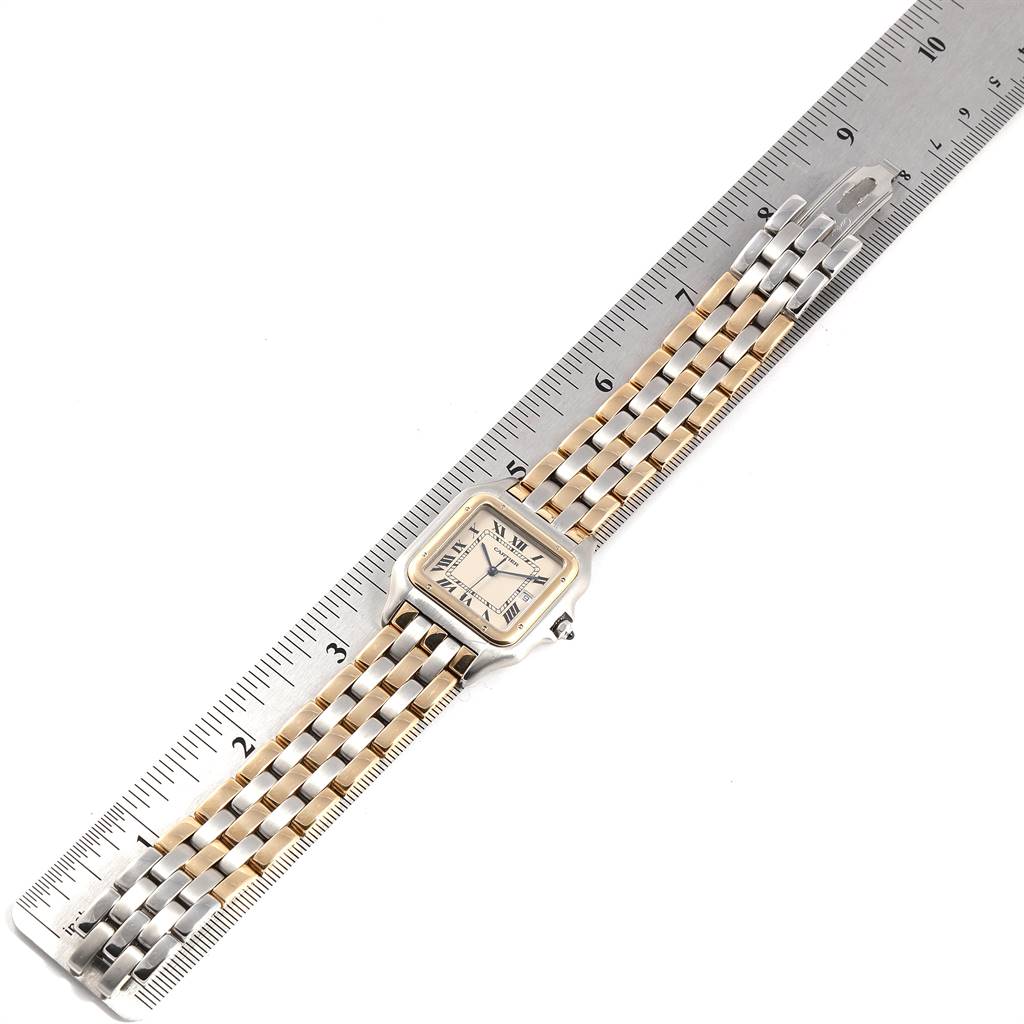 The image shows a Cartier Panthere Steel and Gold (two tone) Beige Dial Steel and Gold (two tone) Beige Dial watch laid flat with a ruler for size reference, highlighting the band and watch face.