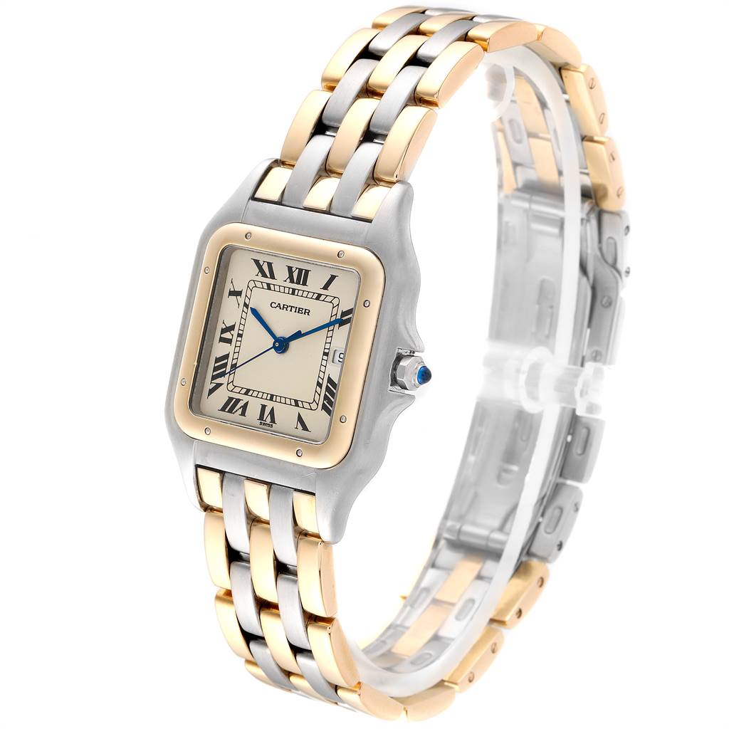 The Panthere de Cartier watch is shown at a slight angle, displaying the face, two-tone bracelet, and crown with a blue gem.