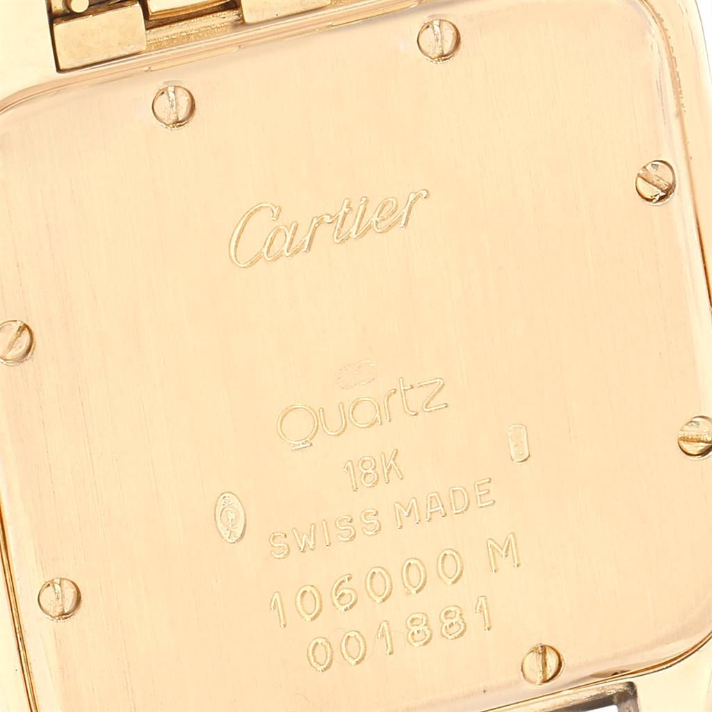This image shows the back case of the Cartier Panthere W25014B9 Men's Yellow Gold Silver Dial W25014B9 Men's Yellow Gold Silver Dial model watch, highlighting the brand name, quartz movement, and 18k gold marking.