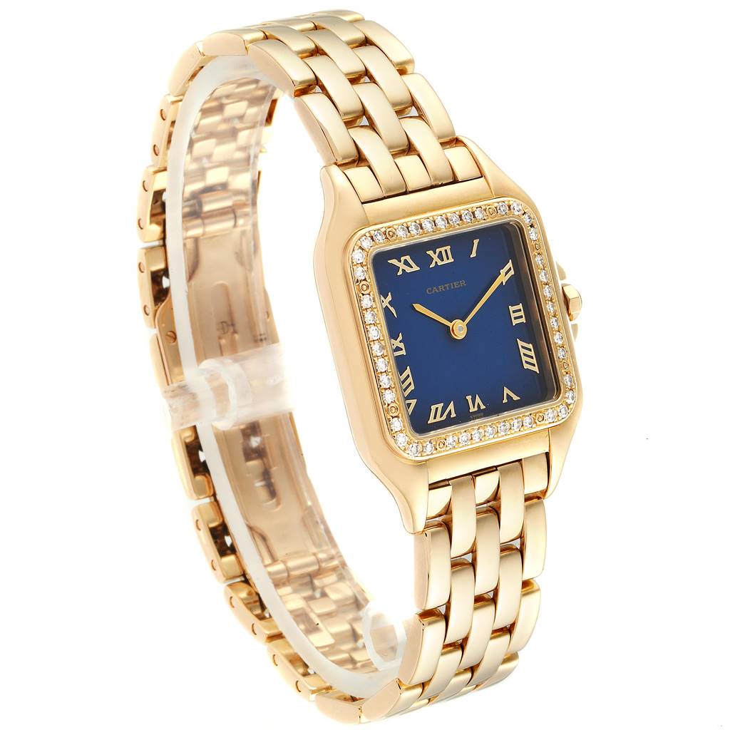 This Cartier Panthere W25014B9 Yellow Gold Blue Dial W25014B9 Yellow Gold Blue Dial watch is shown at an angle highlighting the gold bracelet, blue face, and diamond-encrusted bezel.