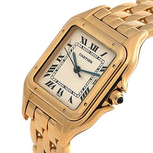 The image shows a Cartier Panthere Yellow Gold Silver Dial Yellow Gold Silver Dial model watch from an angled close-up, highlighting its gold case, bracelet, and dial with Roman numerals.