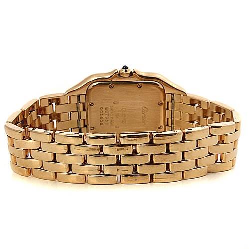 This image shows the back case and bracelet of a Cartier Panthere Yellow Gold Silver Dial Yellow Gold Silver Dial watch, displaying its gold-toned linked design.