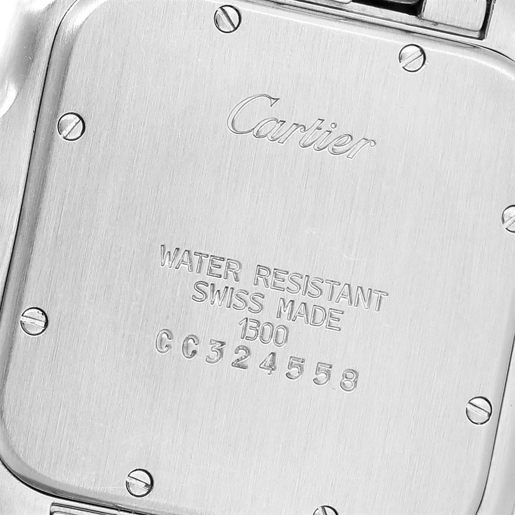This image shows the back case of a Panthere model watch by Cartier from a close-up angle.