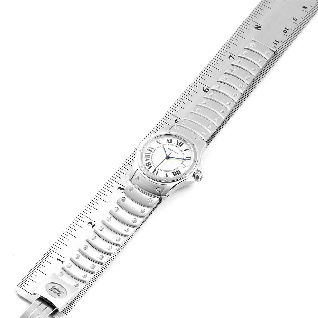 The Panthere model by Cartier is shown from a top-down angle with the face and full bracelet visible, measured against a ruler.