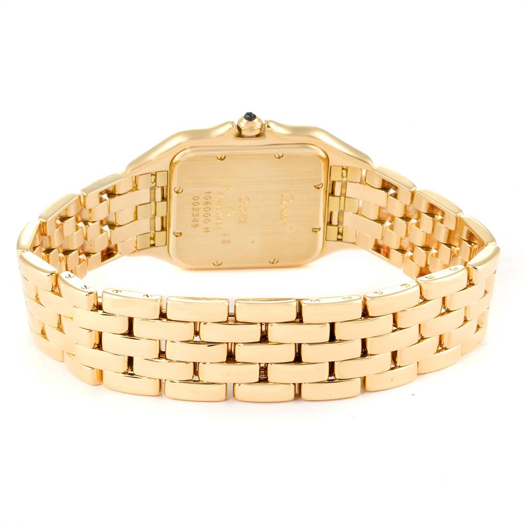 The image shows the back view and bracelet of a Cartier Panthere W25014B9 Men's Yellow Gold Silver Dial W25014B9 Men's Yellow Gold Silver Dial watch, highlighting its gold-tone links and case back.