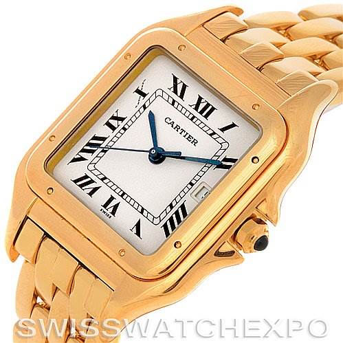 The Cartier Panthere Yellow Gold Silver Dial Yellow Gold Silver Dial watch is shown at an angled view displaying its square face, gold bracelet, and crown with a blue cabochon.