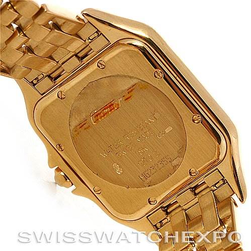 The image shows the case back and a part of the bracelet of a Panthère de Cartier watch viewed from an angled side perspective.
