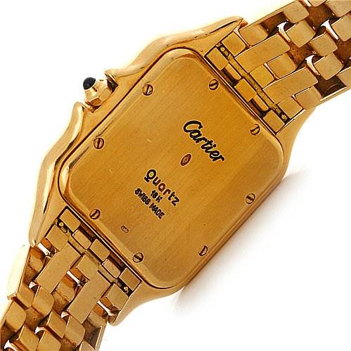 The image shows the back case of a Panthere model by Cartier, highlighting the gold finish and bracelet.