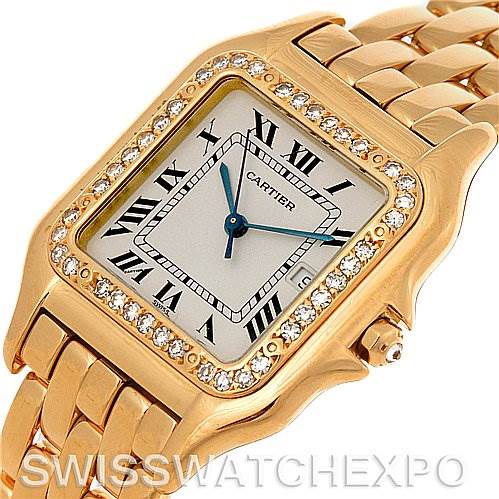 This image shows a close-up angle of a Cartier Panthere Yellow Gold Silver Dial Yellow Gold Silver Dial watch, highlighting its gold case, Roman numeral dial, diamond bezel, and metal bracelet.