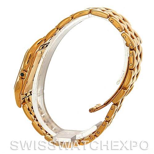 This image shows a Cartier Panthere W25014B9 Men
s Yellow Gold Silver Dial W25014B9 Men
s Yellow Gold Silver Dial watch from a side angle, highlighting its gold bracelet and clasp.