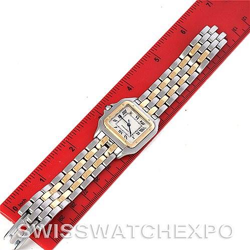 The Panthere model by Cartier is shown from a top-down angle, displaying its face, bracelet, and clasp, along with a red measurement scale.
