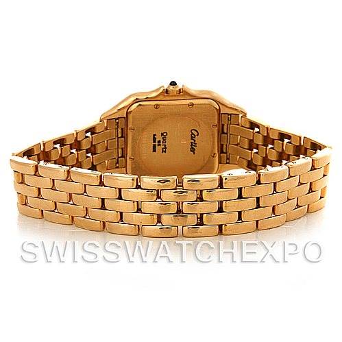 The image shows the back view of a Cartier Panthère watch, highlighting its gold case and bracelet.
