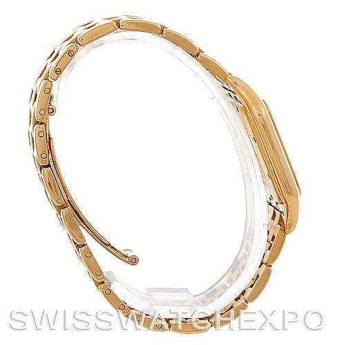 This image shows a side view of the Cartier Panthere W25014B9 Men
s Yellow Gold Silver Dial W25014B9 Men
s Yellow Gold Silver Dial watch, highlighting its gold bracelet and case.
