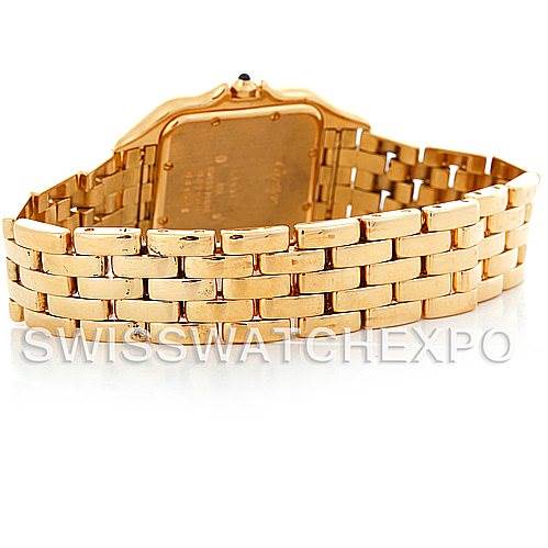 The image shows the back and bracelet of a Panthere model by Cartier, captured at an angle emphasizing the gold links.