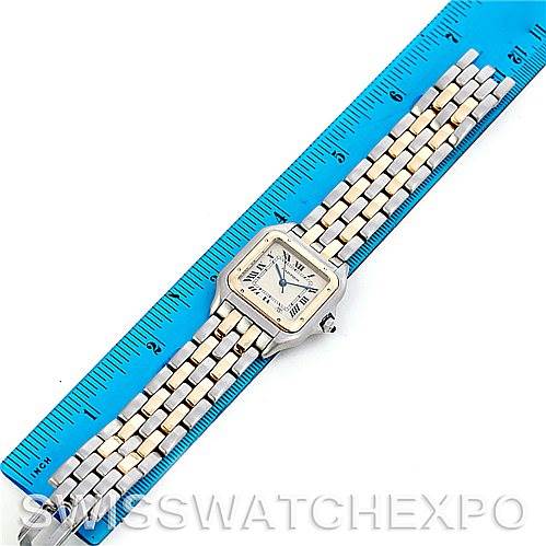 The Cartier Panthere W25028B6 Men
s Steel and Gold (two tone) Silver Dial W25028B6 Men
s Steel and Gold (two tone) Silver Dial watch is displayed fully extended, showing the face, bezel, and entire bracelet alongside a blue ruler.