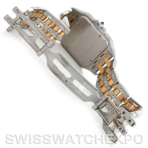 A Panthere model by Cartier watch shown from the back, highlighting the open metal clasp and two-tone bracelet.