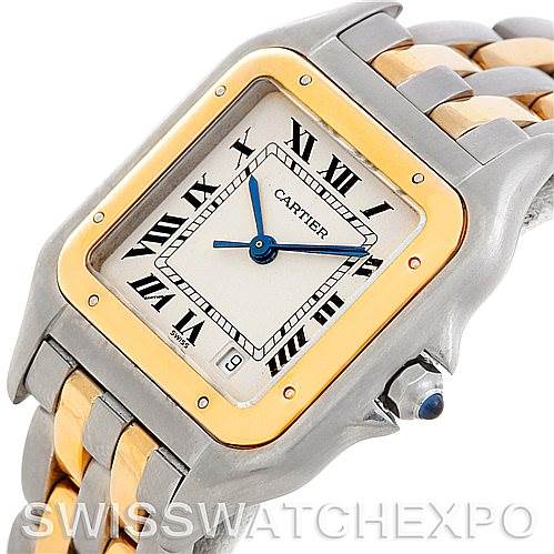 The image shows a close-up angle of a Cartier Panthere W25028B6 Men
s Steel and Gold (two tone) Silver Dial W25028B6 Men
s Steel and Gold (two tone) Silver Dial watch highlighting the face, Roman numeral markers, bezel, and part of the two-tone bracelet.