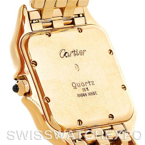 The image shows the back case and bracelet of a Cartier Panthère watch from an oblique angle.