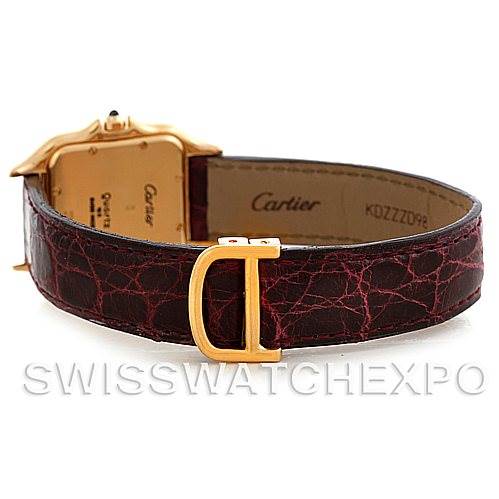 This image shows the side and back of a Cartier Panthere W25014B9 Men
s Yellow Gold Silver Dial W25014B9 Men
s Yellow Gold Silver Dial watch, highlighting its leather strap and buckle.