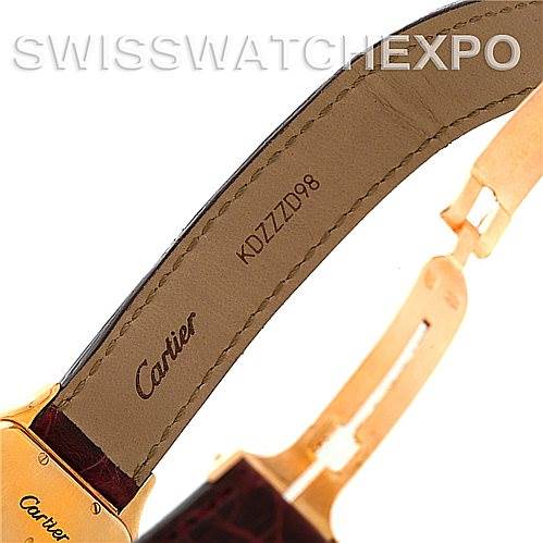 This image shows a close-up view of the inside leather strap, buckle, and clasp of a Cartier Panthere W25014B9 Men
s Yellow Gold Silver Dial W25014B9 Men
s Yellow Gold Silver Dial watch.