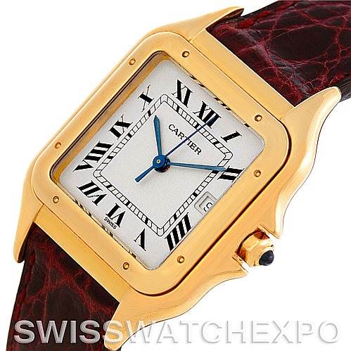 This Cartier Panthere W25014B9 Men
s Yellow Gold Silver Dial W25014B9 Men
s Yellow Gold Silver Dial watch is shown at an angled close-up, highlighting the gold casing, dial, and part of the brown leather strap.