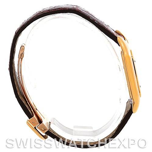 This image shows a side view of the Cartier Panthere W25014B9 Men
s Yellow Gold Silver Dial W25014B9 Men
s Yellow Gold Silver Dial watch, featuring its clasp, strap, and case.