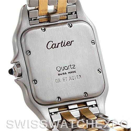 The image shows the back case of a Cartier Panthere W25028B6 Men's Steel and Gold (two tone) Silver Dial W25028B6 Men's Steel and Gold (two tone) Silver Dial watch, focusing on the inscriptions and part of the two-tone metal bracelet.