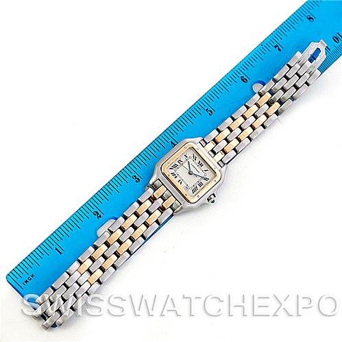 The image shows a Panthere model watch by Cartier, displaying its face and band, measured against a blue ruler.