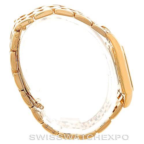 The image shows a side view of a Cartier Panthere W25014B9 Men's Yellow Gold Silver Dial W25014B9 Men's Yellow Gold Silver Dial watch, focusing on the gold bracelet and case.