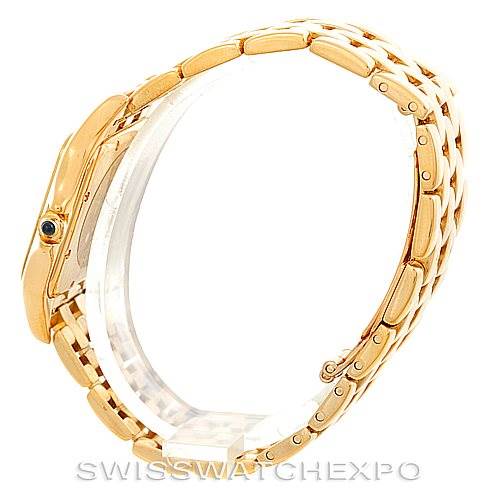 The image shows a side profile of a Cartier Panthere W25014B9 Men's Yellow Gold Silver Dial W25014B9 Men's Yellow Gold Silver Dial watch, highlighting its gold bracelet and crown.