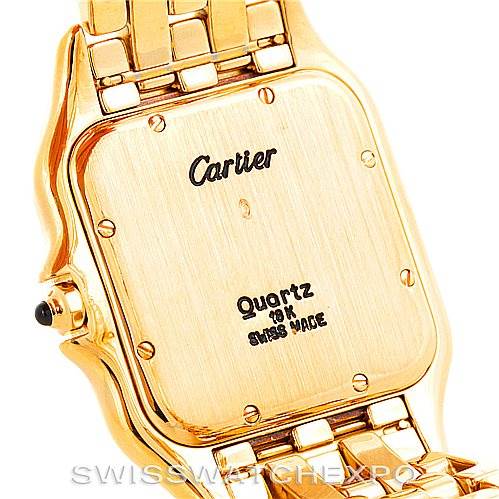 The image shows the back side of a Panthere model by Cartier, highlighting its gold case and bracelet.