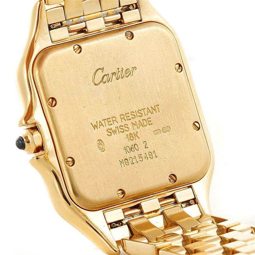 The image shows the back case and part of the bracelet of a Cartier Panthere W25014B9 Men's Yellow Gold Silver Dial W25014B9 Men's Yellow Gold Silver Dial watch.
