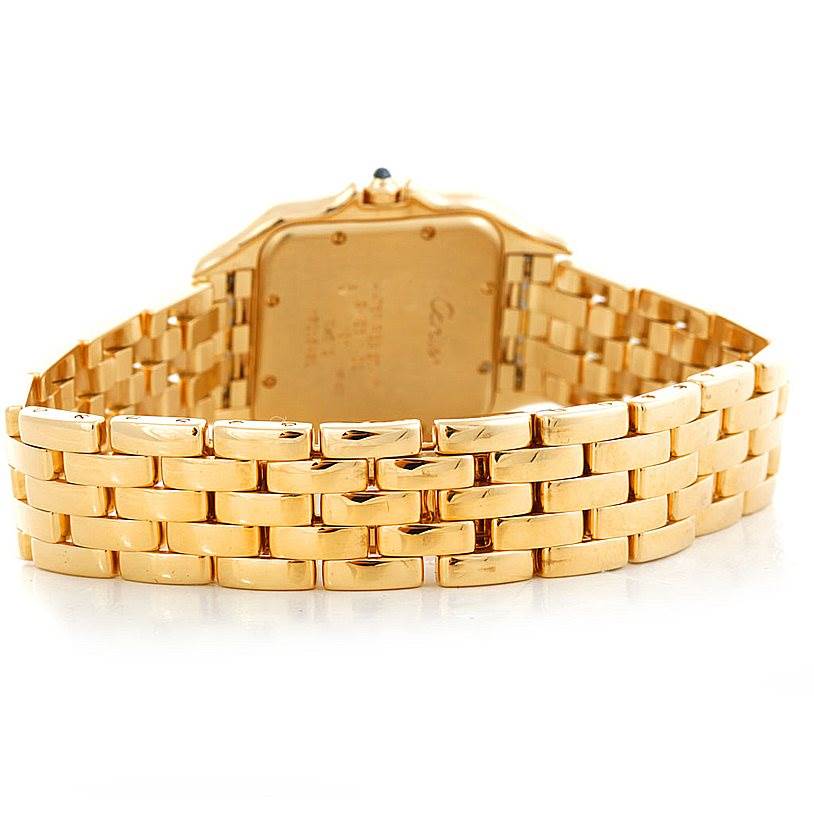 The image shows the back view of the Panthere model watch by Cartier, emphasizing the gold bracelet and case back.
