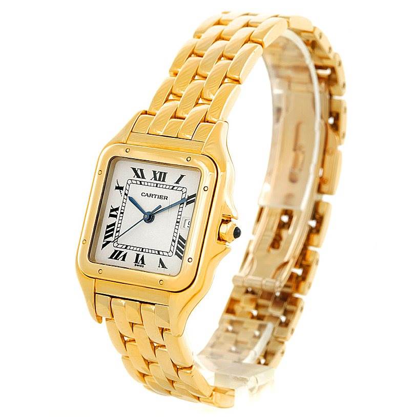 The image shows a front-side angle of a Cartier Panthère model watch, highlighting its gold bracelet and square face with Roman numerals.