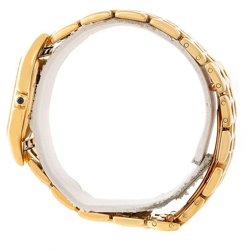 This image shows a side view of the Cartier Panthere W25014B9 Men
s Yellow Gold Silver Dial W25014B9 Men
s Yellow Gold Silver Dial watch, highlighting its gold case and bracelet.