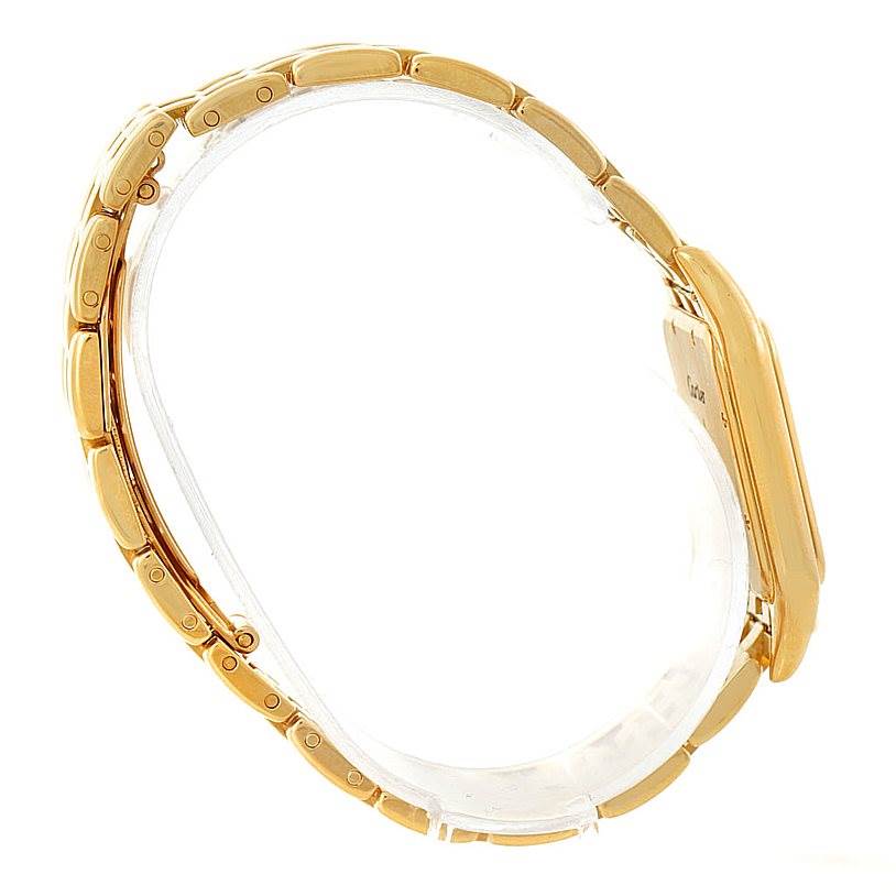 The image shows a side view of the Panthere model watch by Cartier, highlighting its golden strap and case.