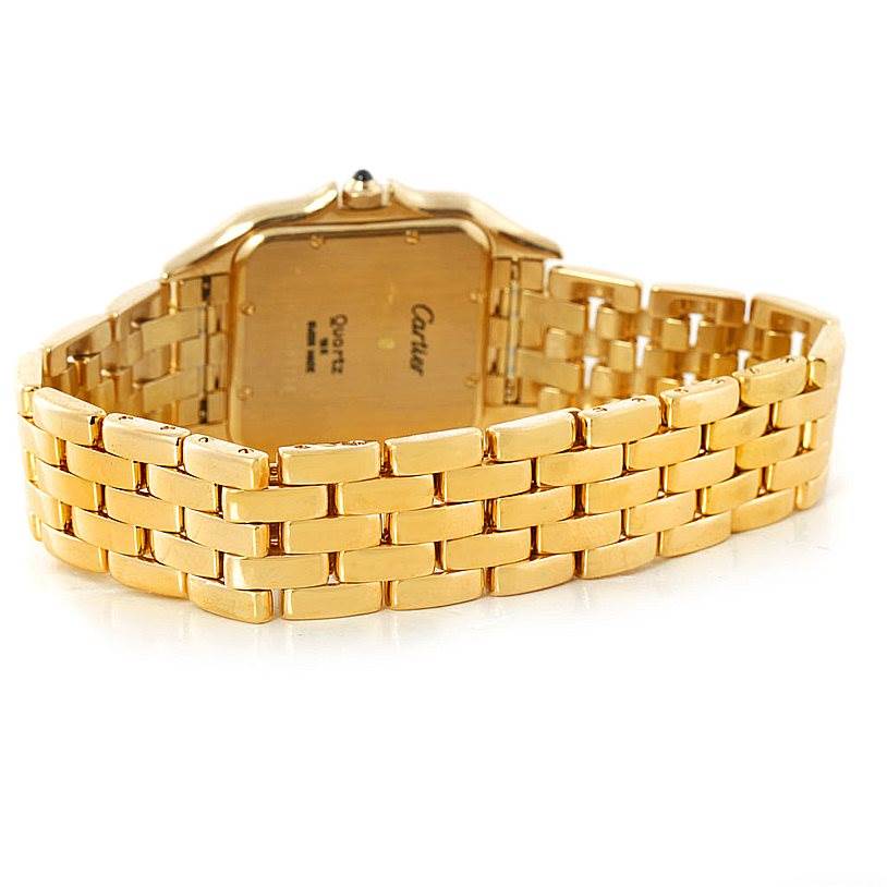 The image shows the back view of a Cartier Panthere W25014B9 Men's Yellow Gold Silver Dial W25014B9 Men's Yellow Gold Silver Dial watch, highlighting its gold case and linked bracelet.