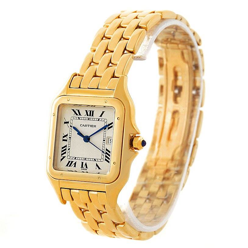 This image shows a close-up angled view of the Panthere de Cartier watch, highlighting its gold casing, Roman numeral dial, and linked bracelet.