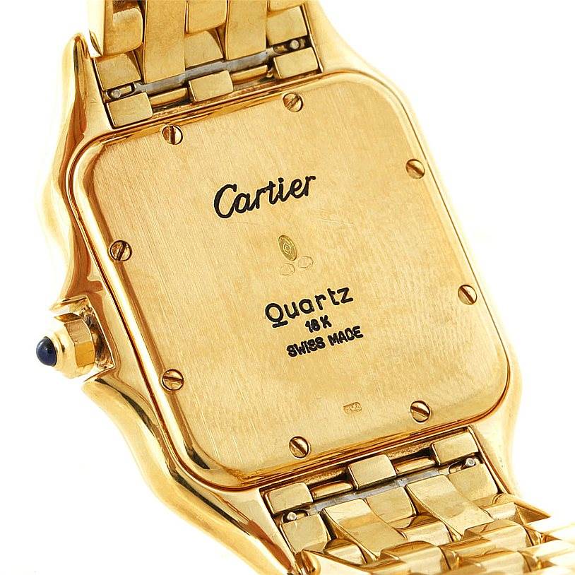 This image shows the back of the Cartier Panthere W25014B9 Men's Yellow Gold Silver Dial W25014B9 Men's Yellow Gold Silver Dial model watch, detailing its markings and gold finish.