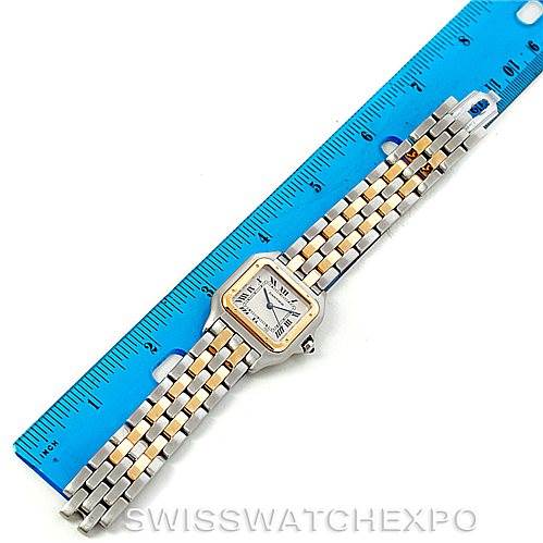 The image shows a top-down view of a Cartier Panthere W25028B6 Men's Steel and Gold (two tone) Beige Dial W25028B6 Men's Steel and Gold (two tone) Beige Dial watch, with a blue ruler next to it for size reference.